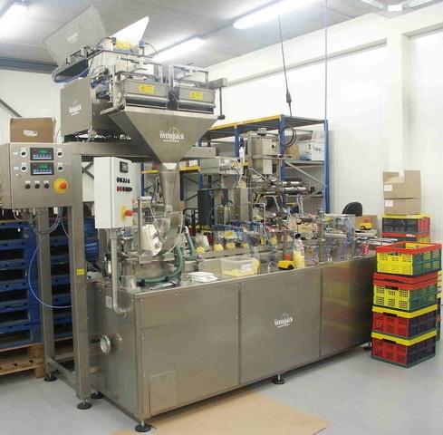 IMH SFLU-03 Block bottom bags fill, seal, folded, eurohol & head labeling machine.